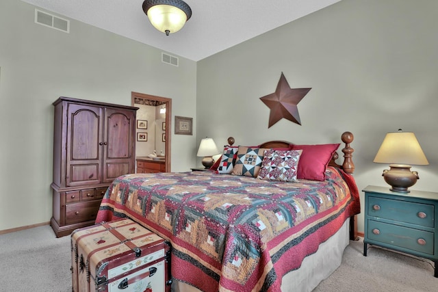 29561 Mentzer Ct, Lindstrom, MN 55045 - bedroom featuring light colored carpet, ensuite bathroom, and baseboards