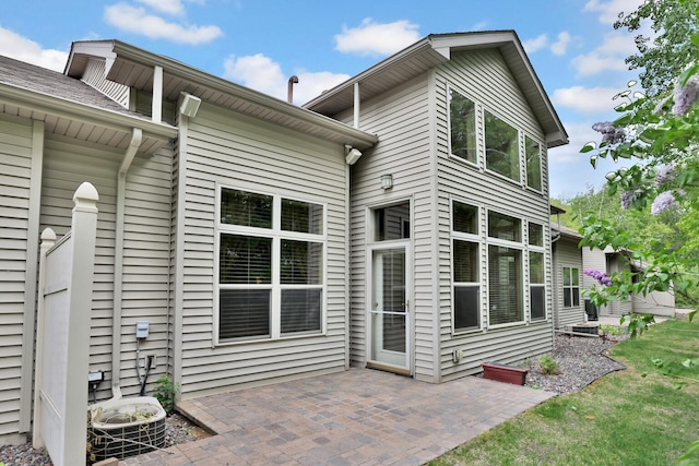 29561 Mentzer Ct, Lindstrom, MN 55045 - back of house featuring a patio area and a yard