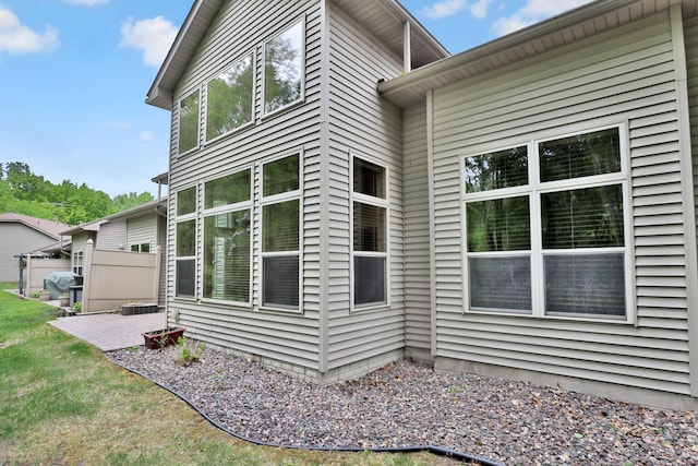 29561 Mentzer Ct, Lindstrom, MN 55045 - view of property exterior with a patio area