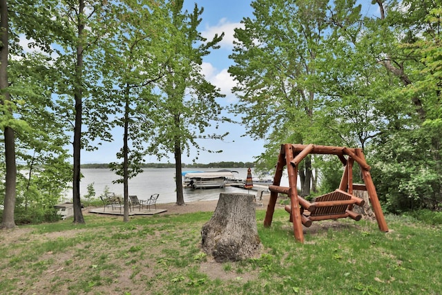 29561 Mentzer Ct, Lindstrom, MN 55045 - view of yard with a water view and a boat dock