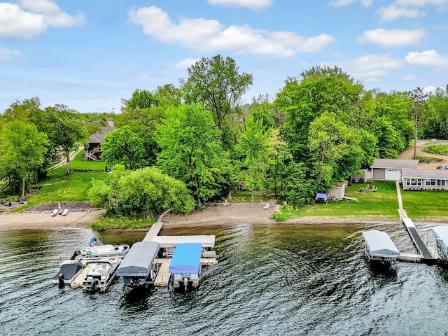 29561 Mentzer Ct, Lindstrom, MN 55045 - dock area with a water view, view of scattered trees, and a lawn