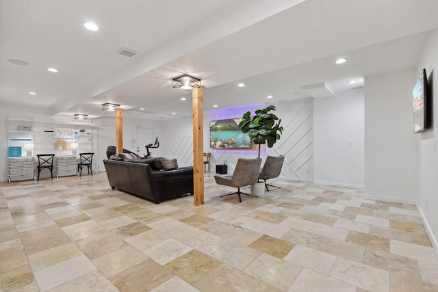living room with visible vents, recessed lighting, and baseboards