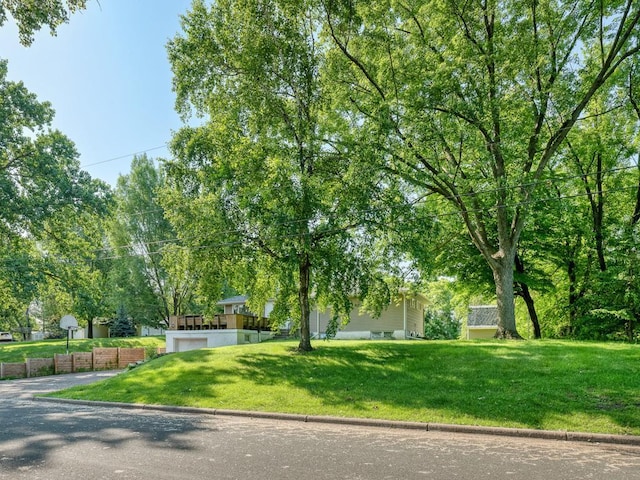 620 Callahan Pl, Mendota Heights, MN 55118 - obstructed view of property featuring a front lawn and a garage