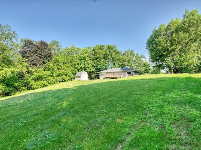 620 Callahan Pl, Mendota Heights, MN 55118 - view of green lawn with a storage shed