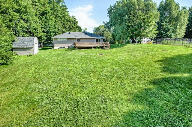 620 Callahan Pl, Mendota Heights, MN 55118 - view of yard featuring a wooden deck and a shed