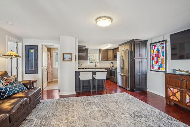 16139 Northwood Rd NW, Prior Lake, MN 55372 - living area with dark wood-style flooring and baseboards