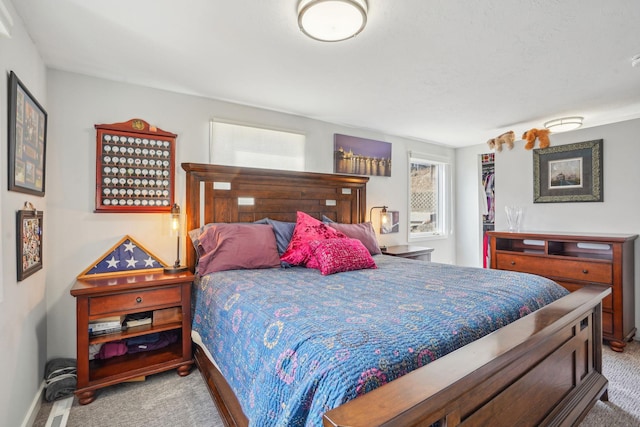 16139 Northwood Rd NW, Prior Lake, MN 55372 - bedroom featuring light carpet, baseboards, and a spacious closet