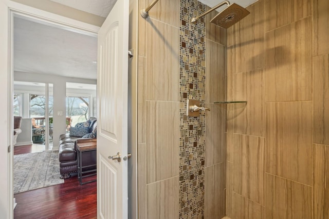16139 Northwood Rd NW, Prior Lake, MN 55372 - bathroom with a tile shower and wood finished floors