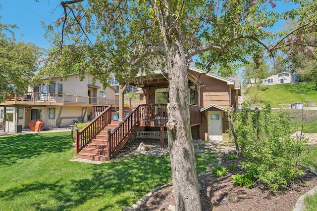 16139 Northwood Rd NW, Prior Lake, MN 55372 - back of property with a lawn, stairway, and a deck