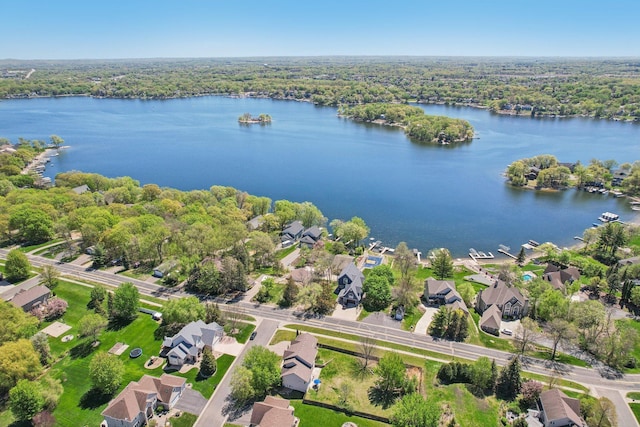 16139 Northwood Rd NW, Prior Lake, MN 55372 - aerial perspective of suburban area featuring a nearby body of water and a heavily wooded area