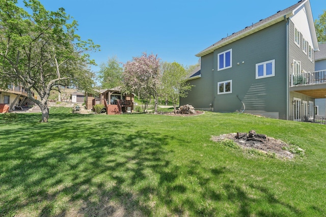 16139 Northwood Rd NW, Prior Lake, MN 55372 - view of grassy yard with a fire pit
