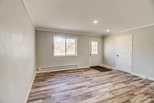 33916 Twin Oaks Loop, Motley, MN 56466 - entryway featuring a baseboard radiator, crown molding, wood finished floors, baseboards, and recessed lighting