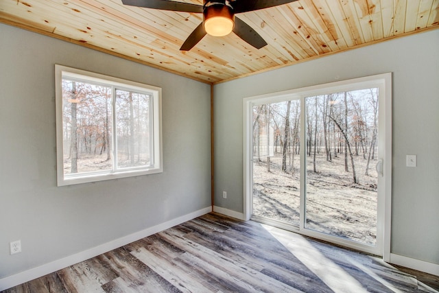 33916 Twin Oaks Loop, Motley, MN 56466 - empty room featuring wood ceiling, wood finished floors, baseboards, and a ceiling fan