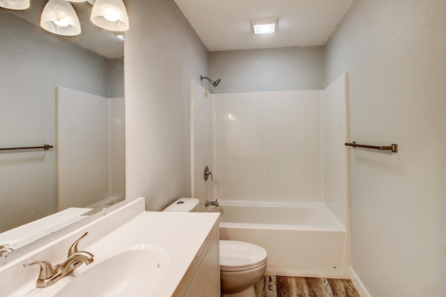 33916 Twin Oaks Loop, Motley, MN 56466 - bathroom featuring wood finished floors, toilet, vanity, and shower / tub combination