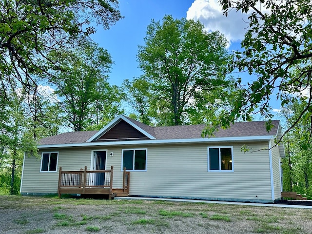 33916 Twin Oaks Loop, Motley, MN 56466 - ranch-style house with a deck and roof with shingles