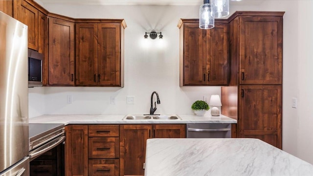 741 Riverside Rd, Holdingford, MN 56340 - kitchen with a sink, stainless steel appliances, and light countertops