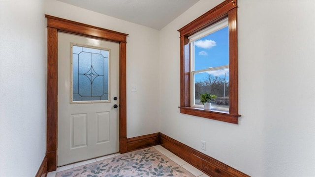 741 Riverside Rd, Holdingford, MN 56340 - entryway featuring baseboards and light tile patterned floors