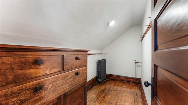 741 Riverside Rd, Holdingford, MN 56340 - washroom with radiator, dark wood-type flooring, and baseboards