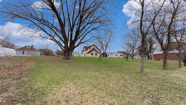 741 Riverside Rd, Holdingford, MN 56340 - view of grassy yard with an outdoor structure