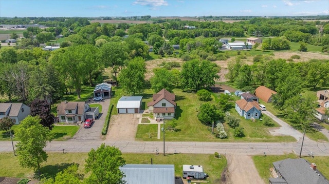 741 Riverside Rd, Holdingford, MN 56340 - aerial overview of property's location with nearby suburban area and a tree filled landscape