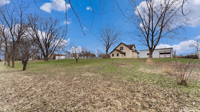 741 Riverside Rd, Holdingford, MN 56340 - view of grassy yard featuring an outdoor structure and an outbuilding