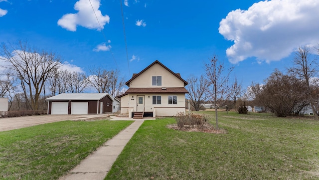 741 Riverside Rd, Holdingford, MN 56340 - back of property with an outdoor structure, a garage, and a yard
