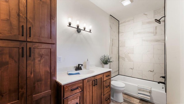 741 Riverside Rd, Holdingford, MN 56340 - full bathroom featuring vanity, toilet, shower / bathtub combination, and wood finished floors