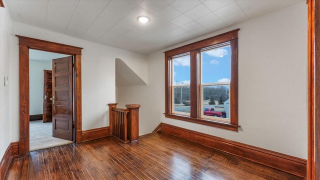 741 Riverside Rd, Holdingford, MN 56340 - empty room featuring dark wood finished floors and baseboards