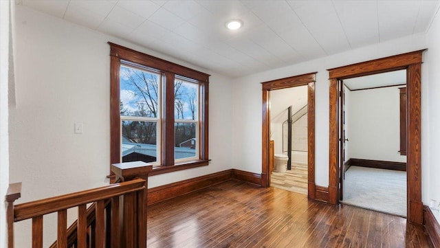 741 Riverside Rd, Holdingford, MN 56340 - spare room featuring dark wood-type flooring, baseboards, and recessed lighting