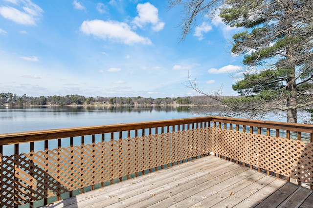deck featuring a water view