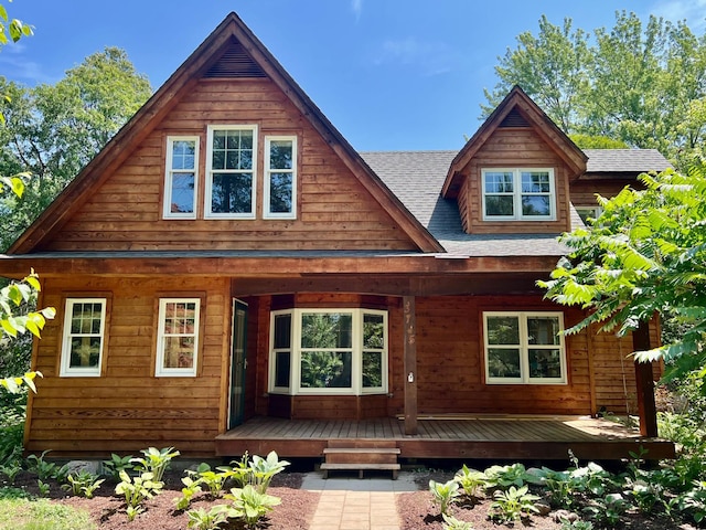 3745 Farmington Rd, Minnetonka, MN 55305 - rear view of house with a shingled roof and a deck