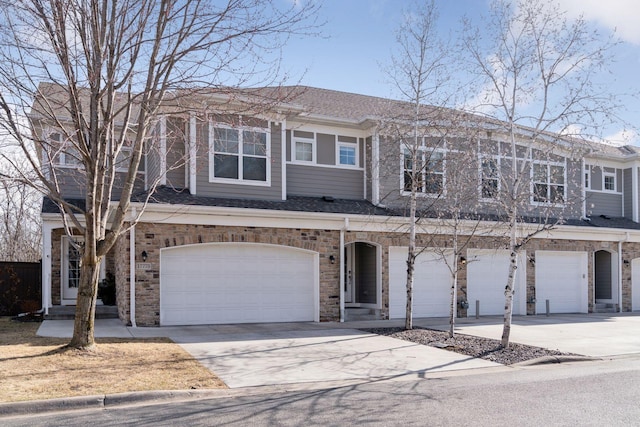 17785 Valley Cove Ct, Minnetonka, MN 55345 - view of property with a garage, driveway, and a shingled roof