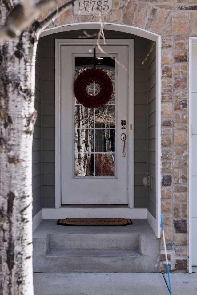 17785 Valley Cove Ct, Minnetonka, MN 55345 - property entrance with stone siding