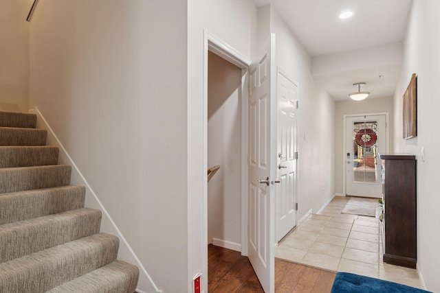 17785 Valley Cove Ct, Minnetonka, MN 55345 - entryway featuring stairs, baseboards, light wood finished floors, and recessed lighting