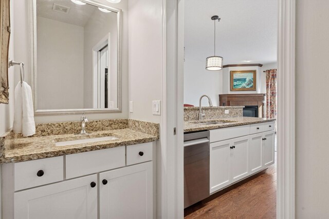 17785 Valley Cove Ct, Minnetonka, MN 55345 - bathroom featuring vanity and wood finished floors