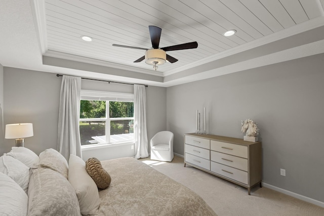 9195 Eagle Ridge Rd, Chanhassen, MN 55317 - bedroom featuring a tray ceiling, crown molding, light carpet, baseboards, and a ceiling fan