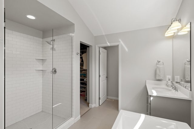 9195 Eagle Ridge Rd, Chanhassen, MN 55317 - full bath with a shower stall, vanity, a spacious closet, tile patterned flooring, and recessed lighting