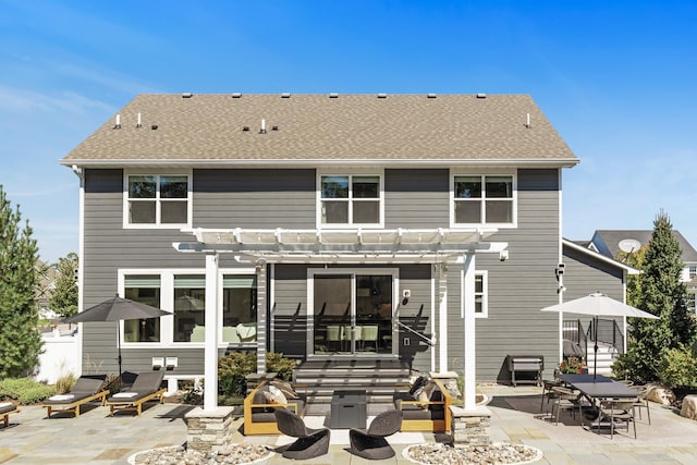 9195 Eagle Ridge Rd, Chanhassen, MN 55317 - rear view of house featuring a pergola, a patio, and roof with shingles