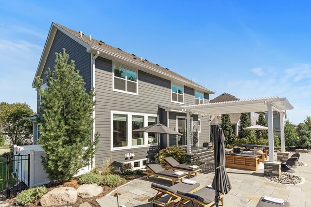 9195 Eagle Ridge Rd, Chanhassen, MN 55317 - rear view of property with a pergola, a patio area, and outdoor lounge area