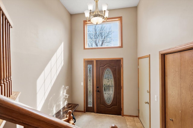 1874 Niagara St, Waconia, MN 55387 - entryway featuring a towering ceiling and a chandelier