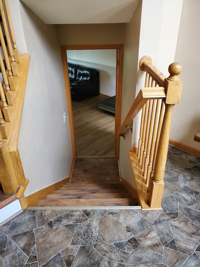 1874 Niagara St, Waconia, MN 55387 - staircase with stone finish flooring and baseboards