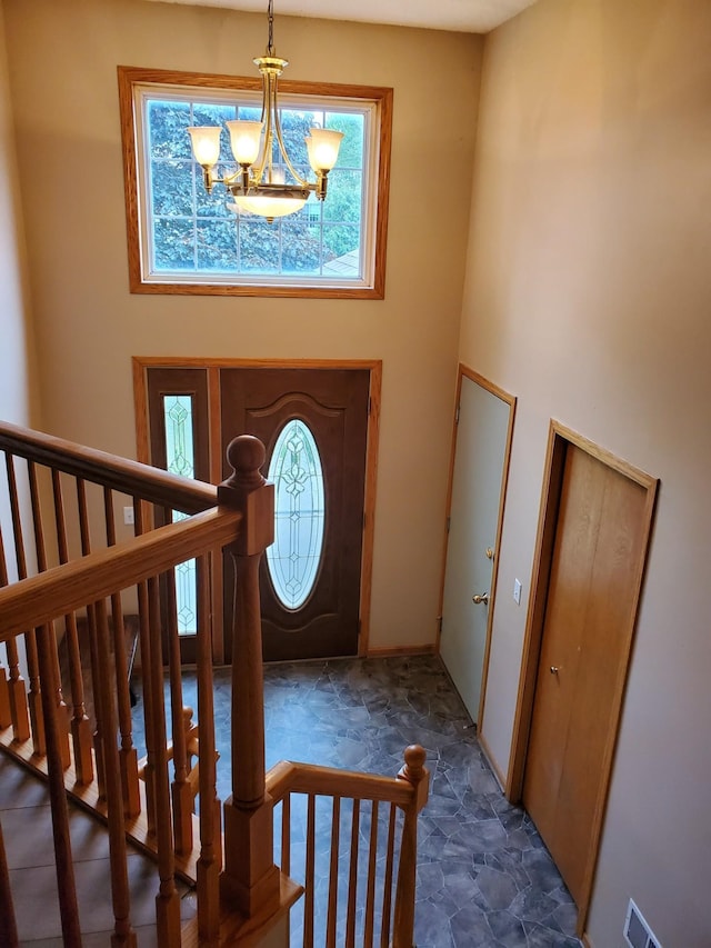 1874 Niagara St, Waconia, MN 55387 - foyer entrance with a high ceiling and a chandelier