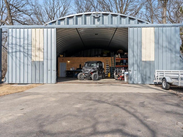 46747 Poss Beach Rd, Pelican Rapids, MN 56572 - view of outdoor structure featuring asphalt driveway