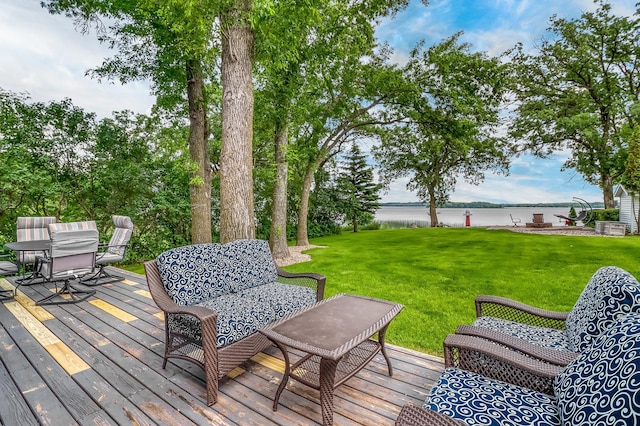46747 Poss Beach Rd, Pelican Rapids, MN 56572 - wooden terrace featuring a water view and a lawn