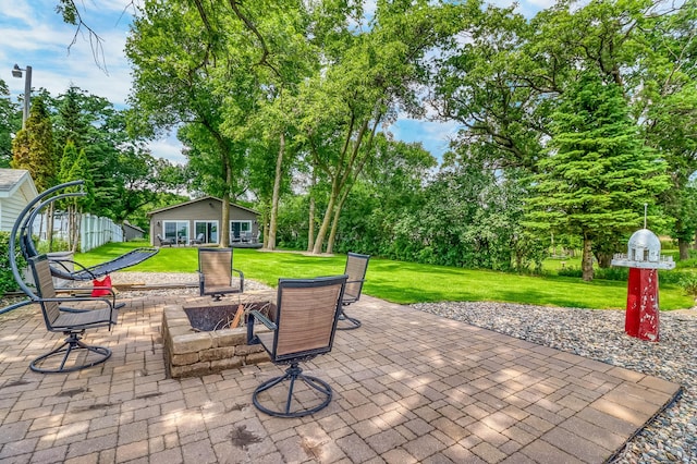 46747 Poss Beach Rd, Pelican Rapids, MN 56572 - view of patio / terrace with an outdoor structure and view of wooded area