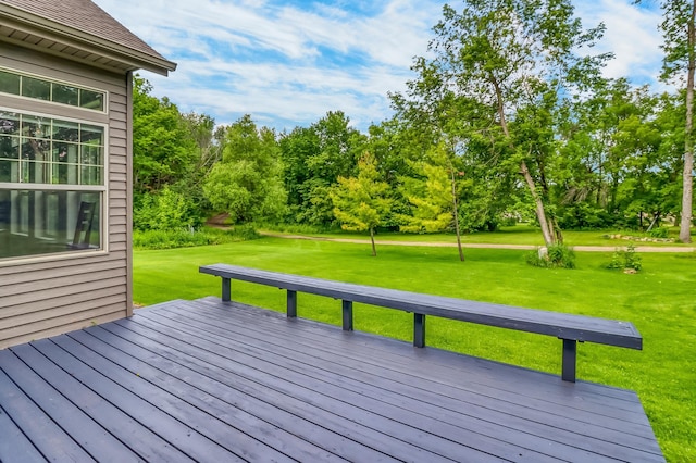 46747 Poss Beach Rd, Pelican Rapids, MN 56572 - wooden deck featuring a yard and view of wooded area
