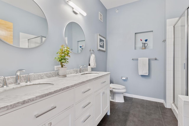 2840 Bryant Ave S Unit E302, Minneapolis, MN 55408 - bathroom with a stall shower, double vanity, and tile patterned floors