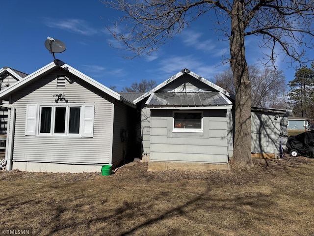 exterior space with metal roof