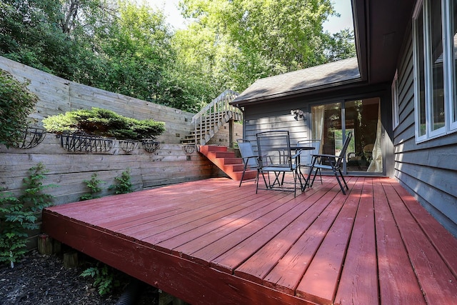 13720 Georgia Dr, Apple Valley, MN 55124 - wooden terrace featuring stairway and outdoor dining space