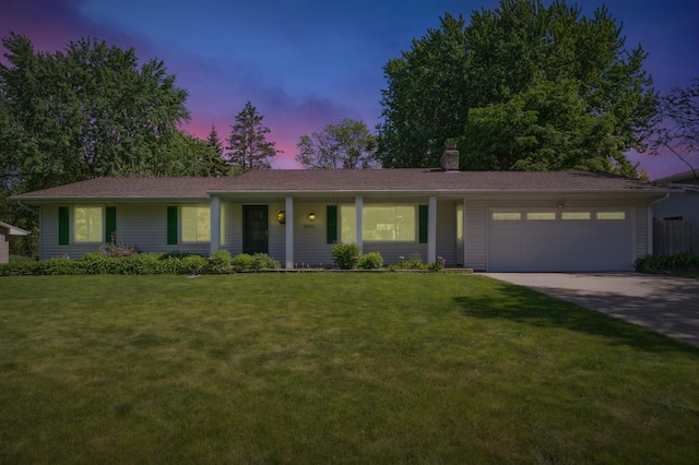 11413 Christansen Ct, Burnsville, MN 55337 - ranch-style house with an attached garage, a front yard, concrete driveway, a chimney, and covered porch